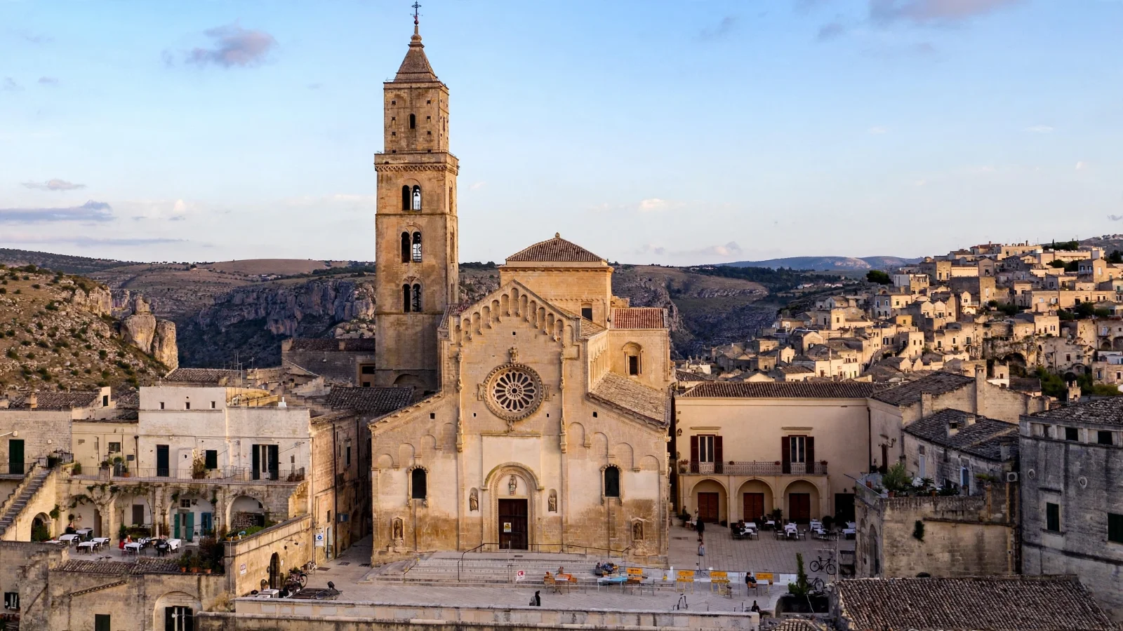 Piazza Duomo and the Romanesque facade of Matera Cathedral on the Civita ridge overlooking Sasso Barisano